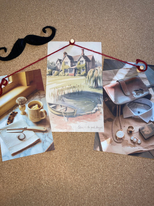 Vintage corkboard with watercolor of an English manor pond, a straight razor and shaving mug, scattered jewelry, and a Poirot Investigates paperback.
